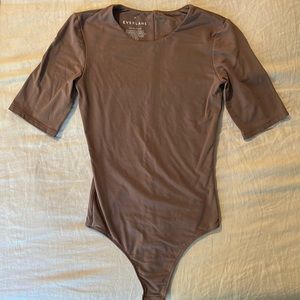 The Short-Sleeve Crew Neck Bodysuit